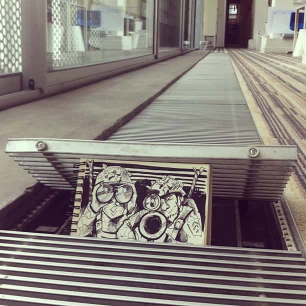 He draws funny little doodles that interact with their environment.
