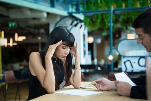 Stressed woman applicant feeling nervous at job interview while hr reading resume,Fear of fail concept. - stock photo - Getty Images | Visoot Uthairam
