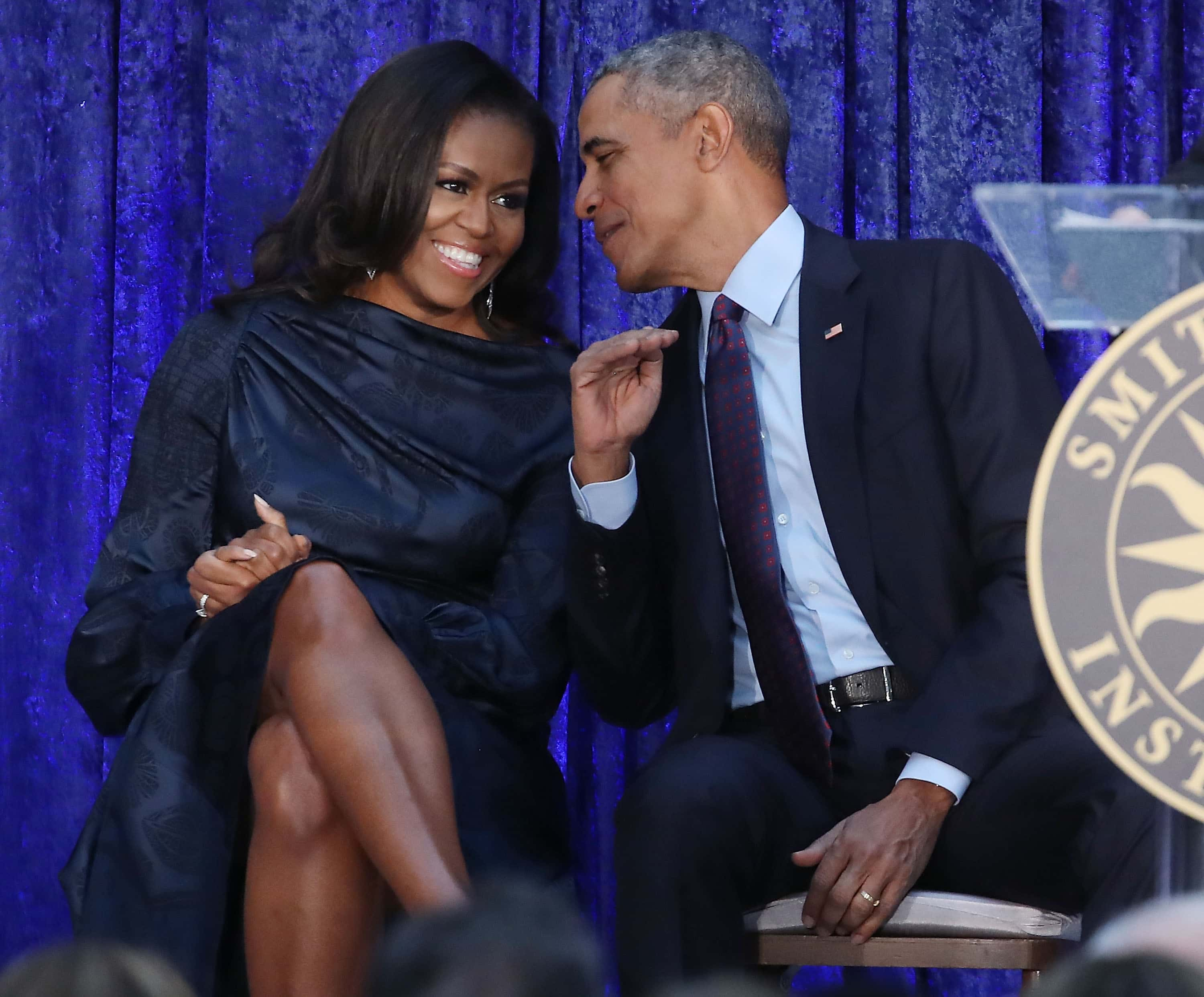 Image Source: Former U.S. President Barack Obama and first lady Michelle Obama participate in the unveiling of their official portraits during a ceremony at the Smithsonian's National Portrait Gallery, on February 12, 2018 in Washington, DC. The portraits were commissioned by the Gallery, for Kehinde Wiley to create President Obama's portrait, and Amy Sherald that of Michelle Obama. (Photo by Mark Wilson/Getty Images)