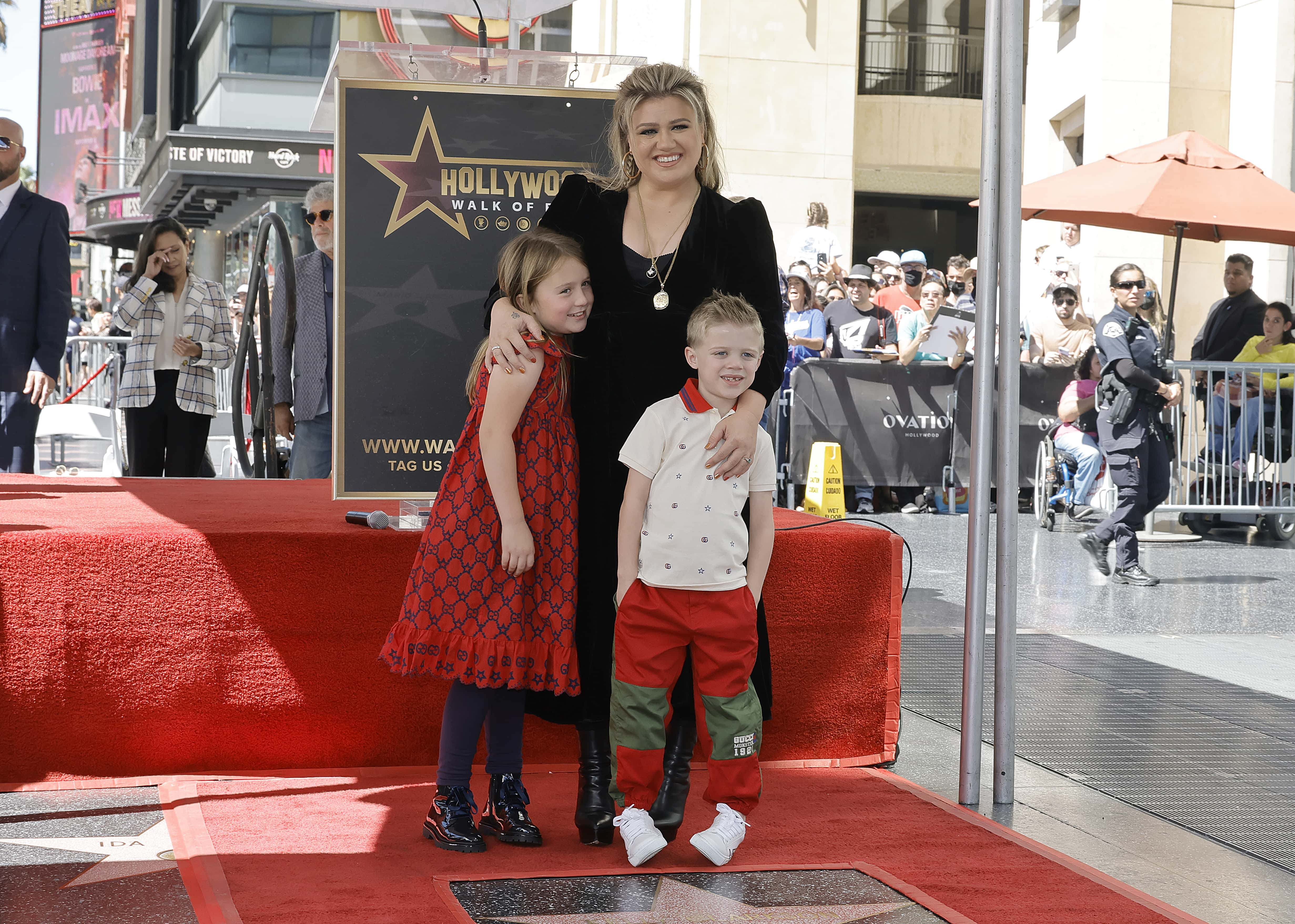 Image Source: River Rose Blackstock, Kelly Clarkson, and Remington Alexander Blackstock attend The Hollywood Walk Of Fame Star Ceremony for Kelly Clarkson on September 19, 2022 in Los Angeles, California. (Photo by Kevin Winter/Getty Images)