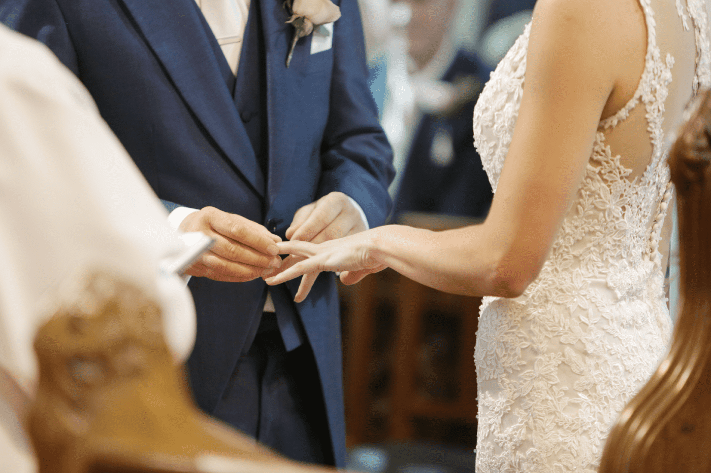 Couple getting married in church - stock photo/Getty Images.