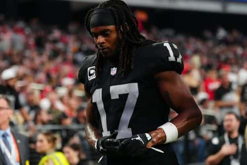 Wide receiver Davante Adams #17 of the Las Vegas Raiders runs off the field during halftime - Getty Images | Jeff Bottari